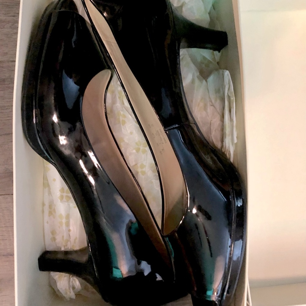 Naturalizer black peep toe heel. Only worn once. In original box